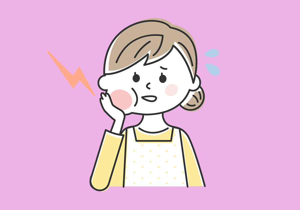 頬が腫れている人